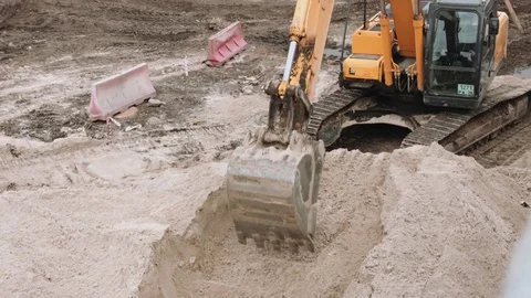 Excavator working on construction site Stock Footage 69778575