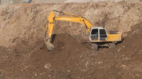 Excavator working at a construction site Stock Footage 86653535