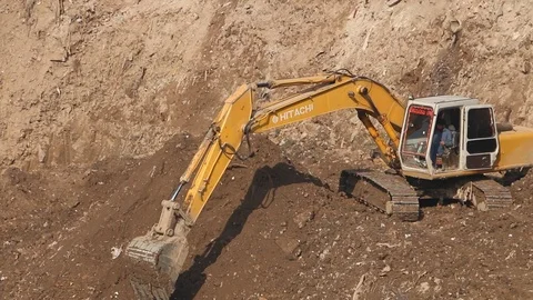 Excavator working at a construction site Stock Footage 86653548