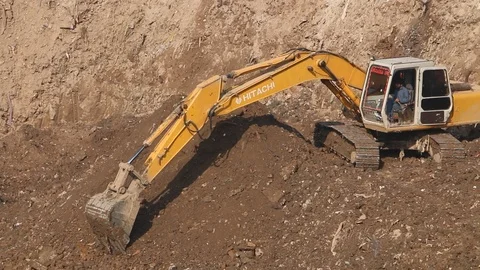 Excavator working at a construction site Stock Footage 86653679