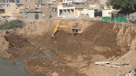 Excavator working at a construction site Stock Footage 86653717