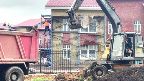The excavator is working on a construction site Stock Footage 196746898