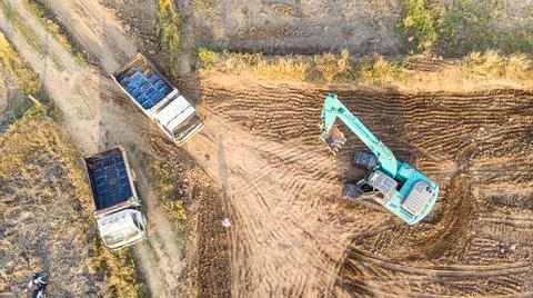 Excavator working on construction site. Stock Photos
