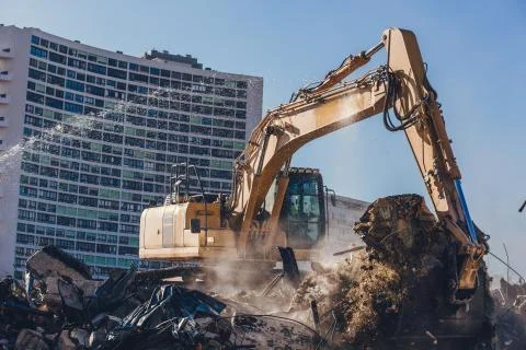 Excavator Working On a Demolition Site Stock Photos