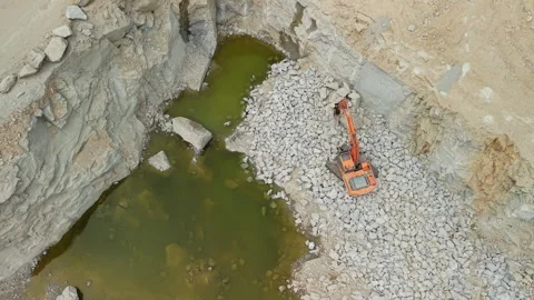 Excavator Working in Large Open Quarry From Above Video stock 341634887