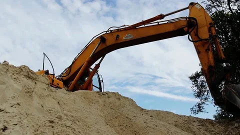 Excavator is working on a modern construction site -- slow motion 動画素材 89918849
