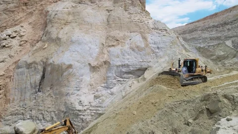 Excavator working in open pit. Footage of vehicle. Sand extraction, building Stock Footage 219951279