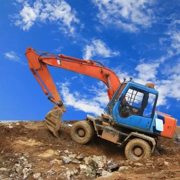Excavator on a working platform Stock Photos