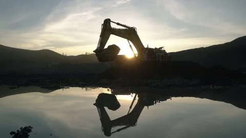 Excavator works in the evening Stock Footage 112886210