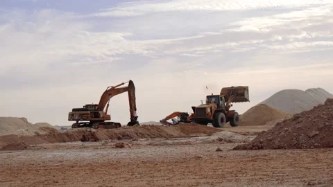 Excavators And A Grader In The Process Of Digging Stock Footage 234458987