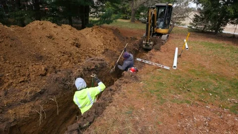 Excavators install underground pipes P5 P1540577 2 Stock-Footage 157128701