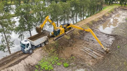 Excavators loading a truck Stock Photos