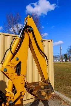 Excavators machine in construction site blue sky background Stock Photos