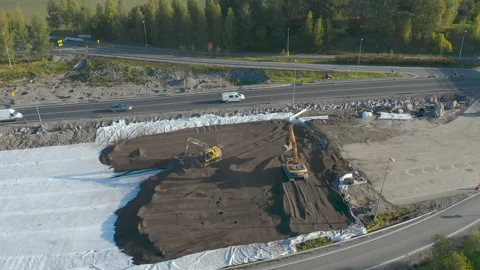 Excavators on road construction site leveling a layer of gravel. Stock Footage 161476778
