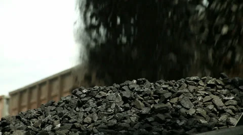 Excavators, unloading coal from a cargo train. 動画素材 25106731