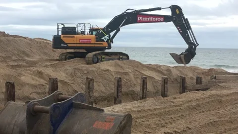 Excavators Working On The Beach Sand 1 of 18 Stock Footage 252838331