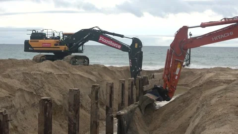 Excavators Working On The Beach Sand 9 of 18 Stock Footage 252840358