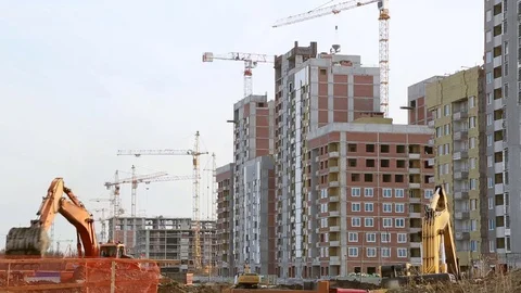 Excavators working at building site Stock Footage 81329868