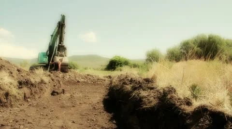Excavators working in desert heat Stock Footage 11244582