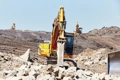 Excavators is working in the mine - selective focus Foto stock