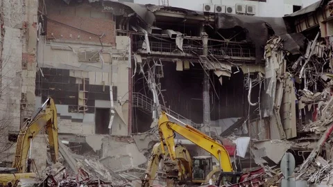 Excavators working on the wreckage of the building, Stock Footage 121128202