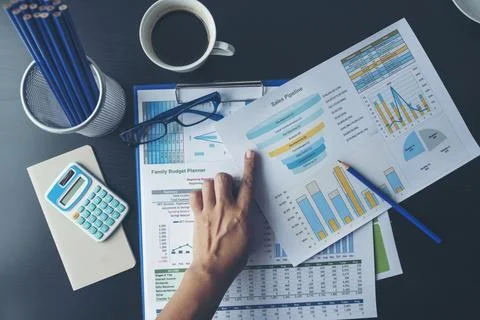 Excel Spreadsheet stats graph analytics data. Accountant hands holding Fina.. Stock Photos