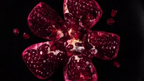 Excellent concentric top view of fresh red pomegranate Stock Footage 77734022