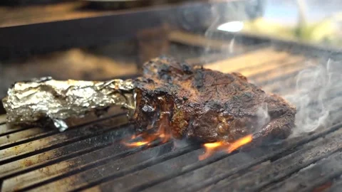 Excellent cut of meat burning on the grill Stock Footage 204420140