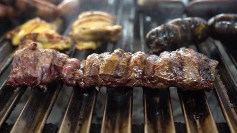 Excellent cut of meat burning on the grill Stock Footage 204422893