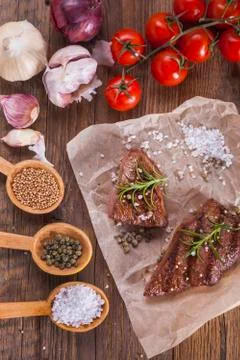 Excellent fried beef served with vegetables and spices Stock Photos