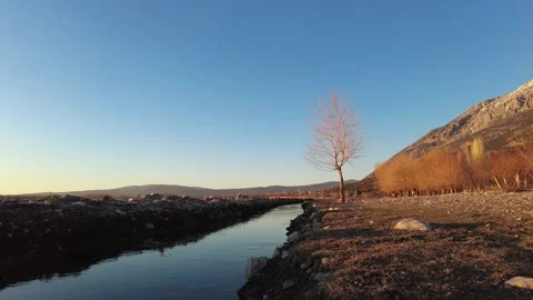 Excellent mountain and river views at sunset. Stock Footage 219131427
