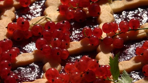 Excellent side-view of open pie with red current berries, rotating clockwise Stock Footage 96886871