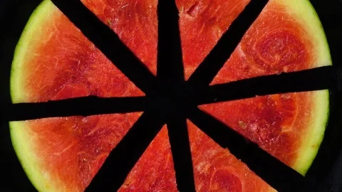 Excellent top view of fresh red water melon, rotating against the clock. Stock Footage 73870057