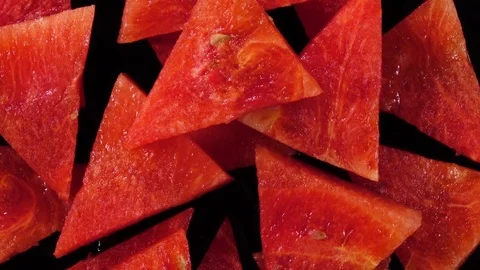 Excellent top view of fresh red water melon in triangle pieces Stock Footage 76965931