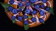 Excellent Top-View Of Round Pie With Fresh Blueberries And Mint Leaves Stock Footage