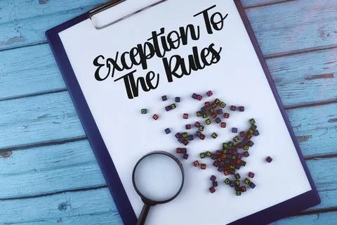 Exception To The Rules wording with magnifying glass on a wooden background. Stock Photos