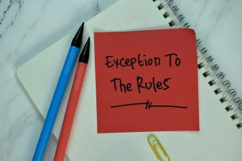 Exception to the Rules write on sticky note isolated on Wooden Table. Stock Photos