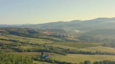 Exceptional aerial view of fields, hills and mountains of Tuscany, Italy Stock Footage 212931038