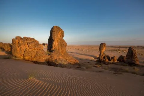 Exceptional rock formation embedded in a large dune area  The Fingers, Es Sba Stock Photos