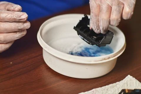 Excess ink is removed from the printhead Stock Photos