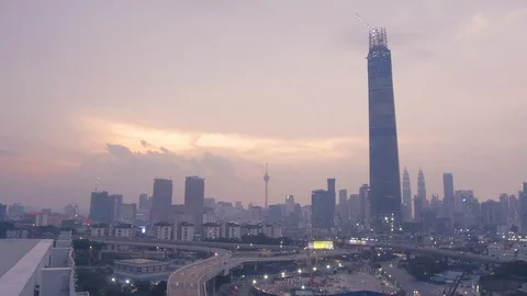 The exchange 106 skyscraper and its developments at sunset, Kuala Lumpur Stock Footage 91318985