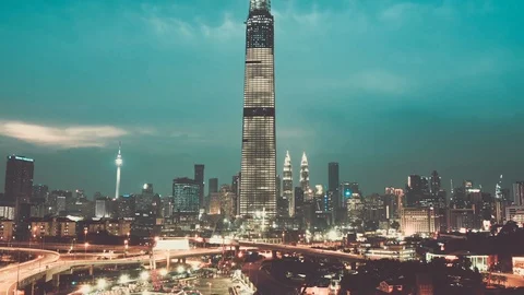 The exchange 106 skyscraper and its developments at sunset, Kuala Lumpur Stock Footage 91324967