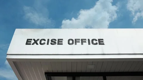 Excise Office word sign displayed on building with blue sky background Stock Footage 318644312