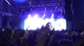 Excited audience waving hands up in air together, enjoying performance, slow-mo HD Footage