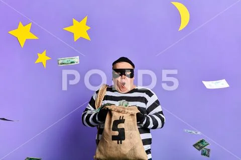 Excited awesome fat prisoner throwing money Stock-Fotos