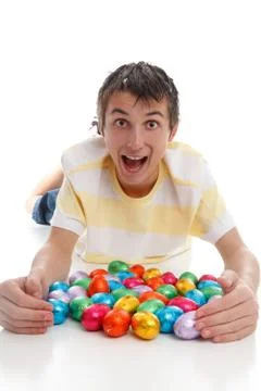 Excited boy easter eggs Stock Photos