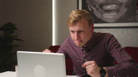 Excited businessman checking email reading great news on laptop. Amazed male Stock Footage 146603835