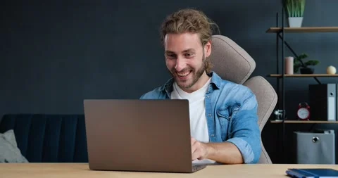 Excited Businessman Freelancer checking Email, reading Great news on Laptop Видео 137531334