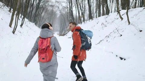 Excited Couple Having Fun in Forest, Running 動画素材 103769261