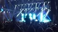 Excited crowd actively clapping their hands, greeting musicians on big stage HD Footage